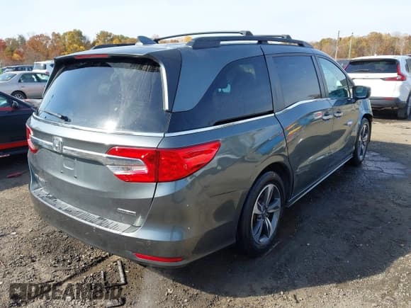 ✅ 2018 Honda Odyssey Touring • VIN: 5FNRL6H85JB044090 • Lot: 43648114. Wystawiony na IAAI z przebiegiem 153 287 mil. Bezpłatny archiwum sprzedaży aukcyjnych z USA i szczegółowy raport historii pojazdu na DreamBid. Zdjęcie 4.
