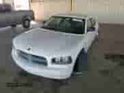 2009 Dodge Charger SXT z VIN 2B3KA33V39H573080, wystawiony jako Copart lot #77794044 z przebiegiem 117 601 mil mil oraz Szkoda całkowita • Salvage title. Historia ofert i sprzedaży dostępna na DreamBid. Obrazek 11.