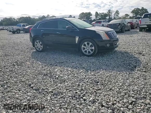✅ 2014 Cadillac SRX Premium Collection • VIN: 3GYFNDE31ES586983 • Lot: 86104535. Wystawiony na Copart z przebiegiem 147 446 mil. Bezpłatny archiwum sprzedaży aukcyjnych z USA i szczegółowy raport historii pojazdu na DreamBid. Zdjęcie 14.