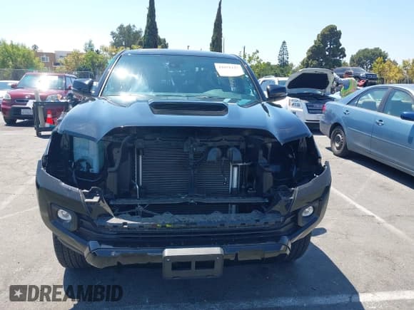 ✅ 2023 Toyota Tacoma SR • VIN: 3TMCZ5AN4PM602174 • Lot: 42851127. Listed on IAAI with 28,356 mi. Free auction sales archive from the USA and detailed vehicle history report at DreamBid. Image 6.