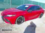 2021 Toyota Camry Hybrid XSE with VIN 4T1K31AK6MU030152, listed as a IAAI auction lot 41878099 with 81,333 mi miles and . Bid and sale history available at DreamBid. Image 2.