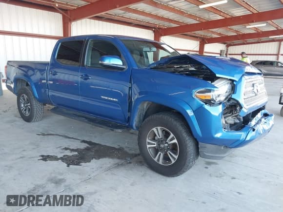 ✅ 2017 Toyota Tacoma SR5 • VIN: 3TMBZ5DN1HM009204 • Lot: 41301765. Listed on IAAI with 129,923 mi. Free auction sales archive from the USA and detailed vehicle history report at DreamBid. Image 1.