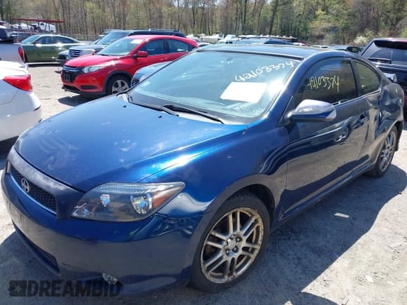 ✅ 2005 Scion tC • VIN: JTKDE177550008977 • Lot: 42103374. Wystawiony na IAAI z przebiegiem 227 401 mil. Bezpłatny archiwum sprzedaży aukcyjnych z USA i szczegółowy raport historii pojazdu na DreamBid. Zdjęcie 2.