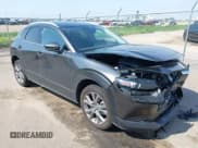 ✅ 2024 Mazda CX-30 S Premium • VIN: 3MVDMBDM6RM627793 • Lot: 42426938. Wystawiony na IAAI z przebiegiem 15 184 mil. Bezpłatny archiwum sprzedaży aukcyjnych z USA i szczegółowy raport historii pojazdu na DreamBid. Zdjęcie 1.