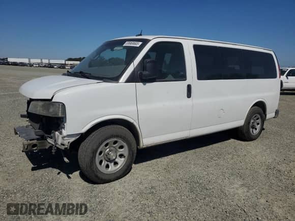 2014 Chevrolet Express Passenger 1LT with VIN 1GNSGCF43E1130315, listed as a Copart auction lot 69969665 with 148,721 mi miles and Salvage title. Bid and sale history available at DreamBid. Image 1.