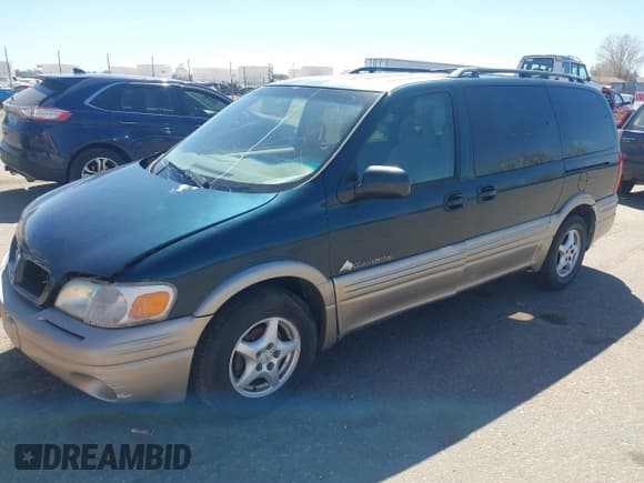 ✅ 1999 Pontiac Montana • VIN: 1GMDX03E0XD166084 • Лот: 41872976. Опубликован ранее на IAAI с пробегом 196 027 миль. Бесплатный доступ к архиву аукционных продаж из США и подробный отчёт об истории автомобиля на DreamBid. Изображение 2.