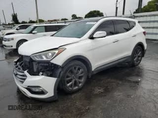 ✅ 2018 Hyundai Santa Fe Ultimate • VIN: 5XYZW4LA9JG537852 • Лот: 81812715. Опубликован ранее на Copart с пробегом 124 269 миль. Бесплатный доступ к архиву аукционных продаж из США и подробный отчёт об истории автомобиля на DreamBid. Изображение 1.