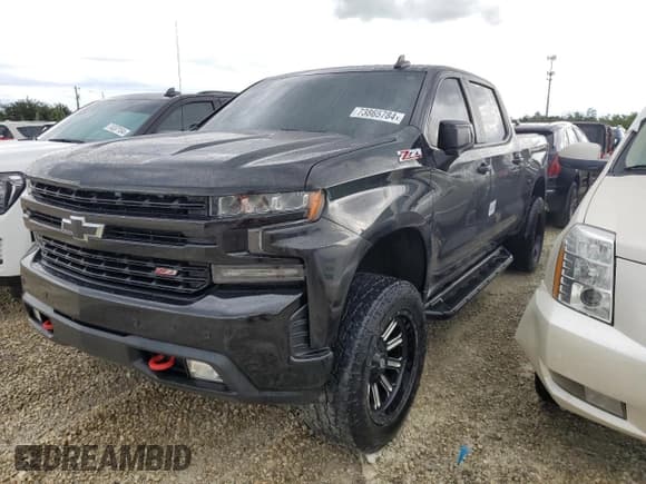 ✅ 2020 Chevrolet Silverado 1500 LT Trail Boss • VIN: 1GCPYFED2LZ310026 • Lot: 73865784. Wystawiony na Copart z przebiegiem 77 082 mil. Bezpłatny archiwum sprzedaży aukcyjnych z USA i szczegółowy raport historii pojazdu na DreamBid. Zdjęcie 1.