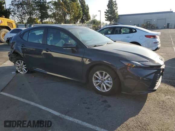 2025 Toyota Camry LE with VIN 4T1DAACK8SU067003, listed as a Copart auction lot 84061975 with 9,394 mi miles and Salvage title. Bid and sale history available at DreamBid. Image 4.