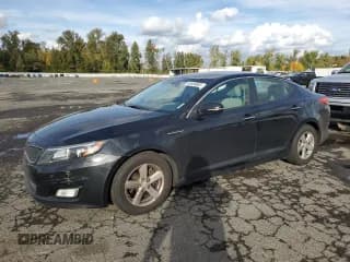 ✅ 2015 Kia Optima LX • VIN: 5XXGM4A70FG510264 • Lot: 90406065. Listed on Copart with 246,279 mi. Free auction sales archive from the USA and detailed vehicle history report at DreamBid. Image 1.