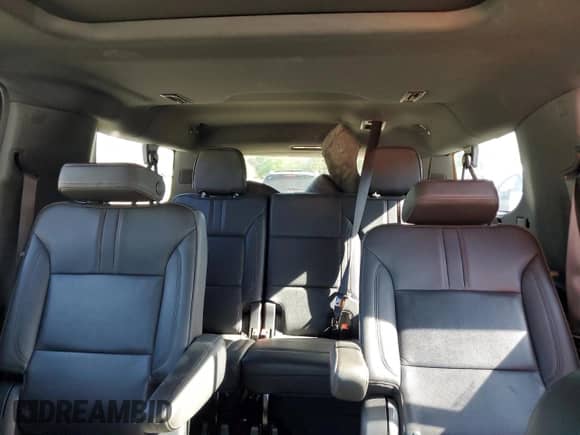 ✅ 2021 Chevrolet Suburban RST • VIN: 1GNSCEKD5MR335499 • Lot: 54932675. Wystawiony na Copart z przebiegiem 147 185 mil. Bezpłatny archiwum sprzedaży aukcyjnych z USA i szczegółowy raport historii pojazdu na DreamBid. Zdjęcie 10.