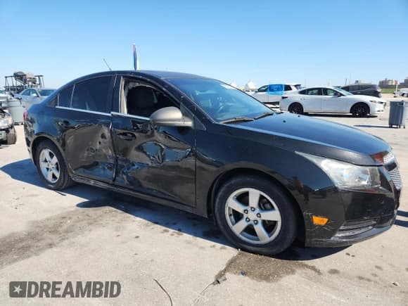 ✅ 2014 Chevrolet Cruze 1LT • VIN: 1G1PC5SB5E7424833 • Lot: 85906975. Listed on Copart with 128,300 mi. Free auction sales archive from the USA and detailed vehicle history report at DreamBid. Image 4.