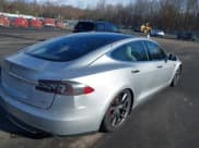 ✅ 2015 Tesla Model S 85D • VIN: 5YJSA1H23FFP78479 • Lot: 43801158. Listed on IAAI with 253,441 mi. Free auction sales archive from the USA and detailed vehicle history report at DreamBid. Image 4.