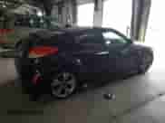 2012 Hyundai Veloster w/Red Int z VIN KMHTC6AD1CU054411, wystawiony jako Copart lot #73357964 z przebiegiem 12 486 mil mil oraz Szkoda całkowita • Salvage title. Historia ofert i sprzedaży dostępna na DreamBid. Obrazek 3.