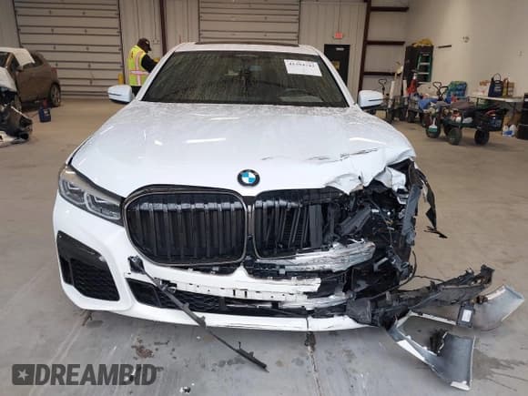 ✅ 2022 BMW 7 Series 750i xDrive • VIN: WBA7U2C02NCG79415 • Lot: 41394743. Listed on IAAI with 31,839 mi. Free auction sales archive from the USA and detailed vehicle history report at DreamBid. Image 12.