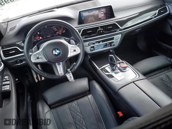 ✅ 2020 BMW 7 Series 740i xDrive • VIN: WBA7T4C02LCE14229 • Лот: 54592095. Опубликован ранее на Copart с пробегом 46 403 миль. Бесплатный доступ к архиву аукционных продаж из США и подробный отчёт об истории автомобиля на DreamBid. Изображение 8.