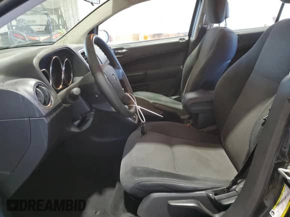 2010 Dodge Caliber SXT z VIN 1B3CB4HA3AD552566, wystawiony jako Copart lot #77544244 z przebiegiem 148 850 mil mil oraz Szkoda całkowita • Salvage title. Historia ofert i sprzedaży dostępna na DreamBid. Obrazek 7.