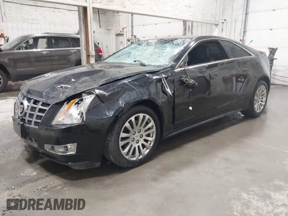✅ 2013 Cadillac CTS Performance • VIN: 1G6DJ1E32D0169937 • Lot: 43566951. Listed on IAAI with 96,503 mi. Free auction sales archive from the USA and detailed vehicle history report at DreamBid. Image 2.