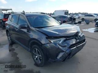 ✅ 2018 Toyota RAV4 XLE • VIN: JTMWFREV0JJ185602 • Lot: 43468504. Listed on IAAI with 113,161 mi. Free auction sales archive from the USA and detailed vehicle history report at DreamBid. Image 1.