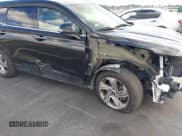 ✅ 2022 Hyundai Santa Fe SEL • VIN: 5NMS34AJ3NH404867 • Lot: 43484971. Listed on IAAI with 163,193 mi. Free auction sales archive from the USA and detailed vehicle history report at DreamBid. Image 6.