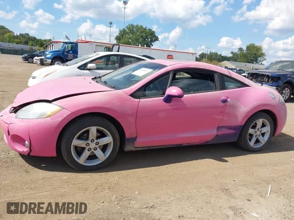 ✅ 2009 Mitsubishi Eclipse GS • VIN: 4A3AK24F29E015041 • Lot: 43138517. Listed on IAAI with 115,610 mi. Free auction sales archive from the USA and detailed vehicle history report at DreamBid. Image 14.