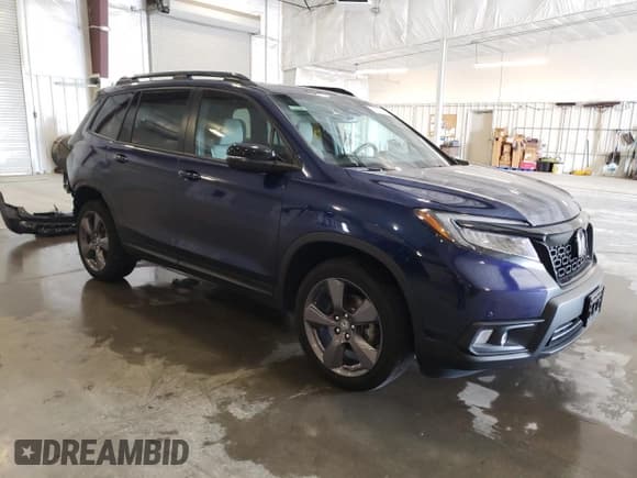 ✅ 2021 Honda Passport Touring • VIN: 5FNYF8H95MB032064 • Lot: 71826565. Listed on Copart with 37,259 mi. Free auction sales archive from the USA and detailed vehicle history report at DreamBid. Image 4.