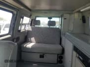 ✅ 1997 Volkswagen EuroVan CV • VIN: WV2EH8703VH131565 • Lot: 56605235. Listed on Copart with 131,372 mi. Free auction sales archive from the USA and detailed vehicle history report at DreamBid. Image 10.