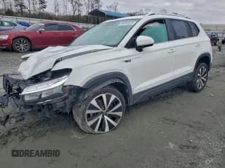 ✅ 2022 Volkswagen Taos SE • VIN: 3VVLX7B2XNM095785 • Lot: 95341615. Listed on Copart with 74,225 mi. Free auction sales archive from the USA and detailed vehicle history report at DreamBid. Image 1.
