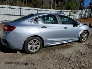 ✅ 2017 Chevrolet Cruze LT • VIN: 1G1BE5SM4H7169702 • Lot: 68022522. Listed on Copart with 76,406 mi. Free auction sales archive from the USA and detailed vehicle history report at DreamBid. Image 3.