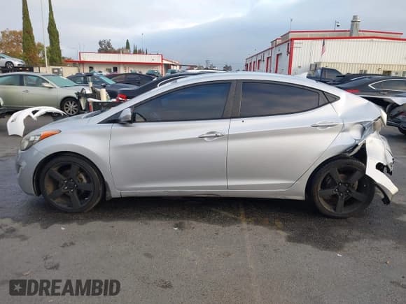 ✅ 2012 Hyundai Elantra GLS • VIN: KMHDH4AE2CU443013 • Lot: 43593422. Listed on IAAI with 169,609 mi. Free auction sales archive from the USA and detailed vehicle history report at DreamBid. Image 14.
