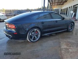 ✅ 2014 Audi RS 7 • VIN: WUAW2CFC7EN903007 • Лот: 76570844. Опубликован ранее на Copart с пробегом 78 955 миль. Бесплатный доступ к архиву аукционных продаж из США и подробный отчёт об истории автомобиля на DreamBid. Изображение 3.