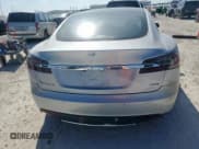 ✅ 2015 Tesla Model S 85D • VIN: 5YJSA1E20FF118288 • Lot: 80924135. Listed on Copart with 123,172 mi. Free auction sales archive from the USA and detailed vehicle history report at DreamBid. Image 6.