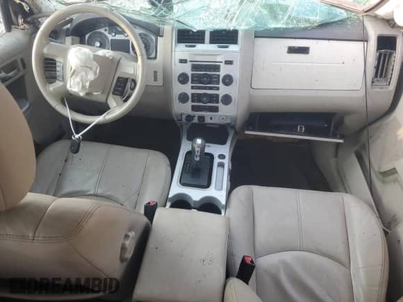 2010 Mercury Mariner Premier с VIN 4M2CN9HG4AKJ12675, выставлен на аукционе Copart как лот 71417445 с пробегом Не указан миль и Списание • Salvage title. История ставок и продаж доступна на DreamBid. Изображение 8.