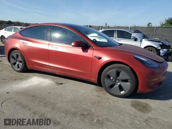✅ 2023 Tesla Model 3 Long Range • VIN: 5YJ3E1EB9PF471400 • Lot: 93712005. Listed on Copart with 28,142 mi. Free auction sales archive from the USA and detailed vehicle history report at DreamBid. Image 4.
