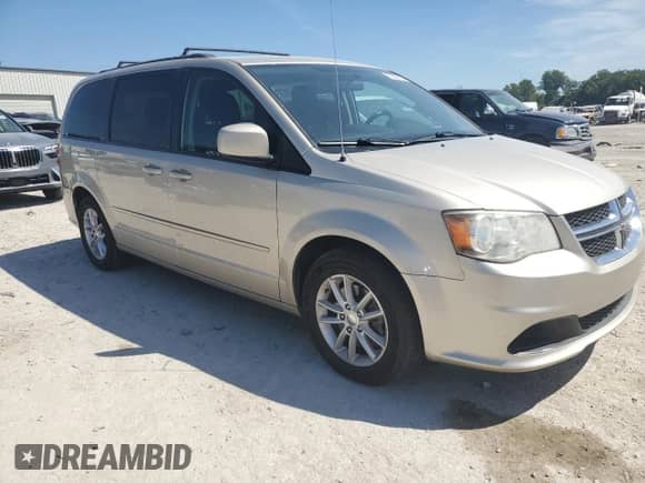 2014 Dodge Grand Caravan SXT z VIN 2C4RDGCG7ER321169, wystawiony jako Copart lot #70516105 z przebiegiem 187 876 mil mil oraz Szkoda całkowita • Salvage title. Historia ofert i sprzedaży dostępna na DreamBid. Obrazek 4.