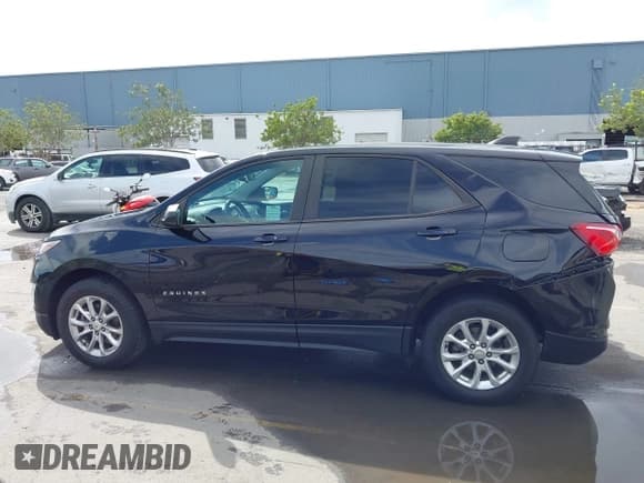 ✅ 2020 Chevrolet Equinox LS • VIN: 2GNAXHEV5L6282755 • Lot: 43363980. Listed on IAAI with 99,456 mi. Free auction sales archive from the USA and detailed vehicle history report at DreamBid. Image 14.
