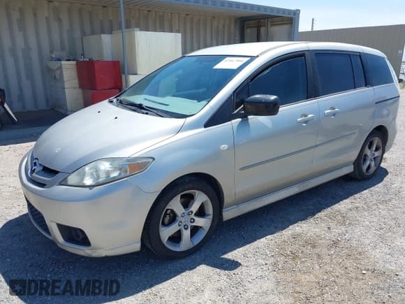 ✅ 2007 Mazda 5 Touring • VIN: JM1CR29L070133007 • Lot: 42467906. Listed on IAAI with 130,921 mi. Free auction sales archive from the USA and detailed vehicle history report at DreamBid. Image 2.