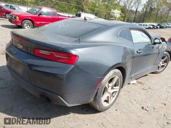 ✅ 2016 Chevrolet Camaro 1LT • VIN: 1G1FB1RX7G0179702 • Lot: 41878598. Listed on IAAI with 103,784 mi. Free auction sales archive from the USA and detailed vehicle history report at DreamBid. Image 4.
