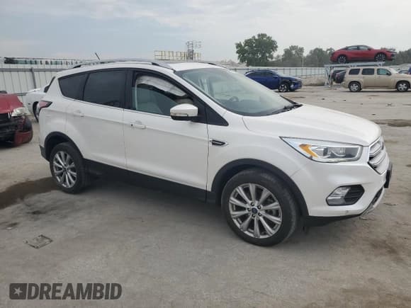 ✅ 2018 Ford Escape Titanium • VIN: 1FMCU9J98JUB25367 • Lot: 81129885. Listed on Copart with 49,037 mi. Free auction sales archive from the USA and detailed vehicle history report at DreamBid. Image 4.