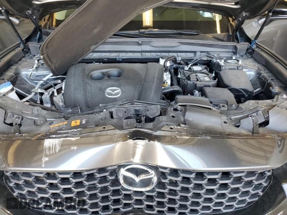 ✅ 2024 Mazda CX-50 S Premium • VIN: 7MMVABDMXRN173083 • Lot: 54336165. Listed on Copart with 11,410 mi. Free auction sales archive from the USA and detailed vehicle history report at DreamBid. Image 12.