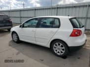 ✅ 2009 Volkswagen Rabbit S • VIN: WVWDB71K79W085935 • Lot: 60697594. Wystawiony na Copart z przebiegiem 102 780 mil. Bezpłatny archiwum sprzedaży aukcyjnych z USA i szczegółowy raport historii pojazdu na DreamBid. Zdjęcie 2.
