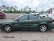 ✅ 2000 Pontiac Grand Am SE1 • VIN: 1G2NF52E7YC523668 • Lot: 42225091. Listed on IAAI with 113,822 mi. Free auction sales archive from the USA and detailed vehicle history report at DreamBid. Image 14.