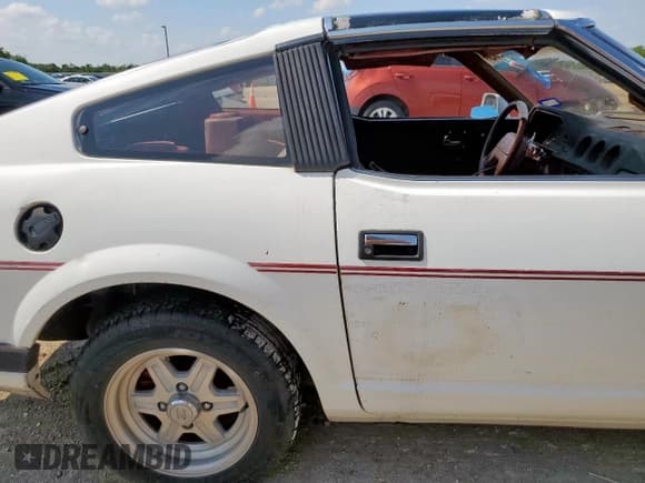 ✅ 1983 Datsun 280ZX • VIN: JN1HZ04S4DX558731 • Лот: 70086065. Опубликован ранее на Copart с пробегом 121 901 миль. Бесплатный доступ к архиву аукционных продаж из США и подробный отчёт об истории автомобиля на DreamBid. Изображение 10.