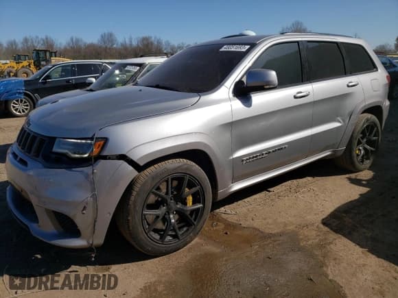 ✅ 2018 Jeep Grand Cherokee • VIN: NJ1454E • Lot: 48051693. Listed on Copart with 66,894 mi. Free auction sales archive from the USA and detailed vehicle history report at DreamBid. Image 1.