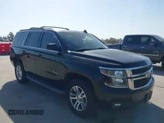 2015 Chevrolet Tahoe LT z VIN 1GNSKBKC7FR600290, wystawiony jako IAAI lot #42836123 z przebiegiem 178 357 mil mil oraz . Historia ofert i sprzedaży dostępna na DreamBid. Obrazek 1.
