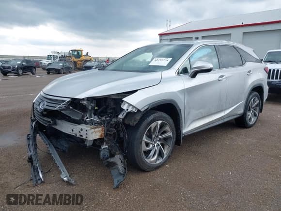 ✅ 2018 Lexus RX 450hL Premium • VIN: JTJDGKCA6J2003954 • Lot: 42259774. Listed on IAAI with 93,706 mi. Free auction sales archive from the USA and detailed vehicle history report at DreamBid. Image 2.