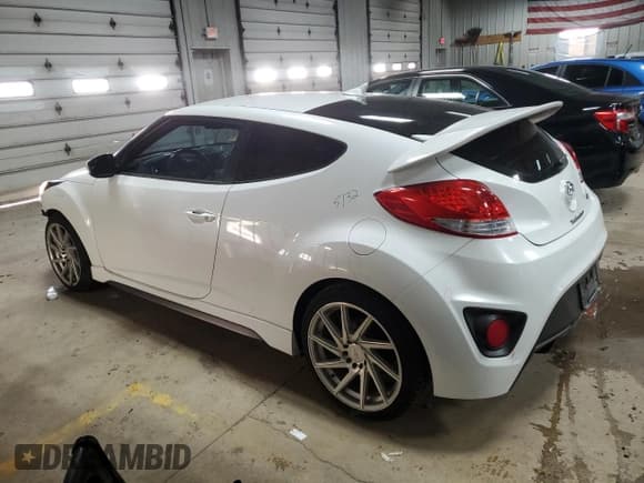 ✅ 2014 Hyundai Veloster Turbo • VIN: KMHTC6AE6EU208574 • Lot: 82103804. Wystawiony na Copart z przebiegiem 123 290 mil. Bezpłatny archiwum sprzedaży aukcyjnych z USA i szczegółowy raport historii pojazdu na DreamBid. Zdjęcie 2.