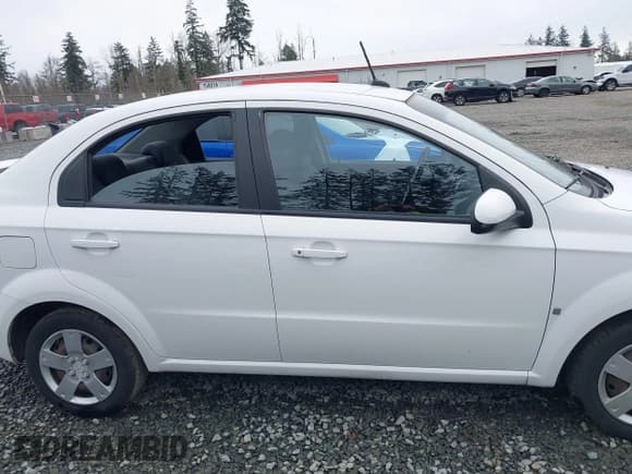 ✅ 2009 Chevrolet Aveo 1LT • VIN: KL1TD56E79B651913 • Lot: 41626867. Wystawiony na IAAI z przebiegiem 55 464 mil. Bezpłatny archiwum sprzedaży aukcyjnych z USA i szczegółowy raport historii pojazdu na DreamBid. Zdjęcie 13.