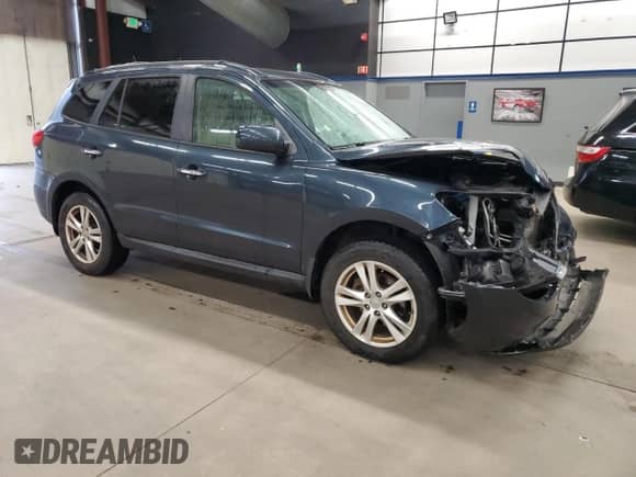 2012 Hyundai Santa Fe Limited с VIN 5XYZK3AB7CG141455, выставлен на аукционе Copart как лот 75635924 с пробегом 122 165 миль миль и Списание • Salvage title. История ставок и продаж доступна на DreamBid. Изображение 4.