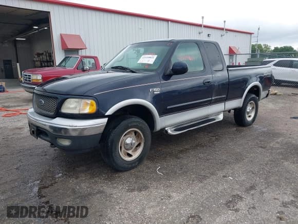 ✅ 2000 Ford F-150 XL • VIN: 1FTRX18L1YNC07244 • Lot: 42339821. Listed on IAAI with 294,032 mi. Free auction sales archive from the USA and detailed vehicle history report at DreamBid. Image 2.